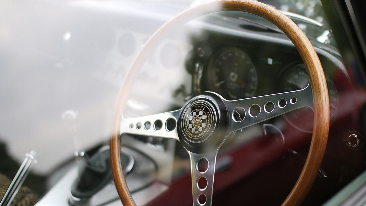 vintage steering wheel through window