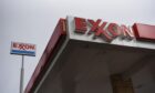 Exxon investor sued for climate proposal promises to back off