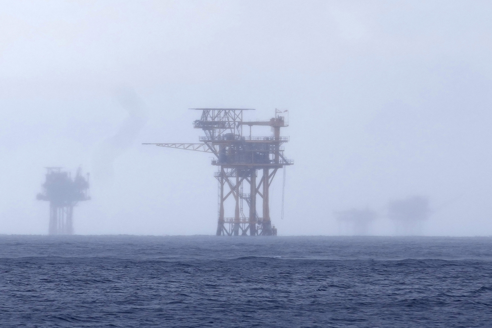 An oil drilling platform on water