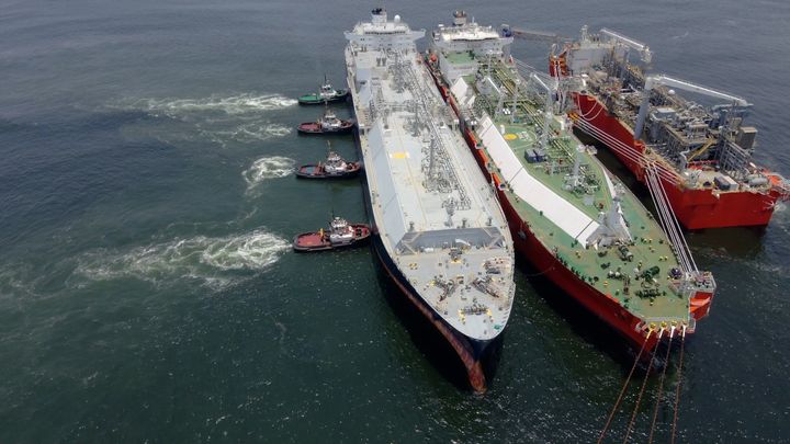 An aerial photo provided by the Italian oil giant Eni shows its liquefied natural gas barges in the Republic of the Congo.