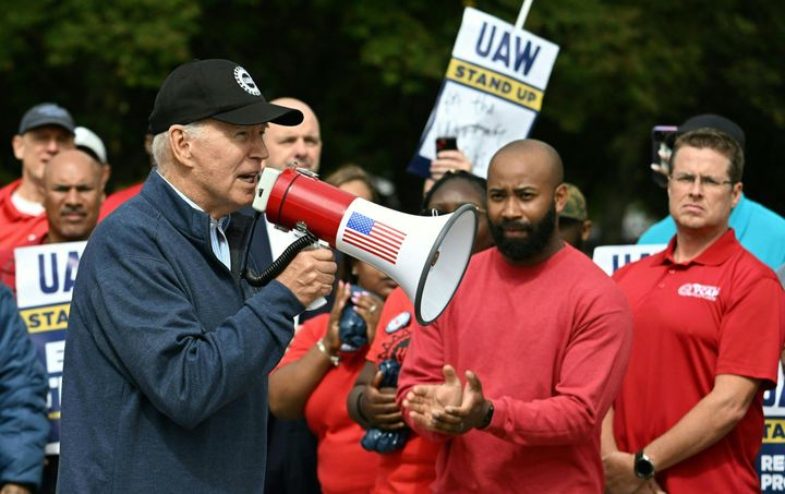 President Joe Biden speaks at a UAW picket line at a General Motors Service Parts Operations plant on Sept. 26, 2023, in Belleville, Michigan. Biden privately was also pushing the Big Three automakers to bring a better deal to the union.